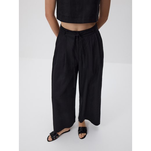 Reserved - Lniane spodnie z wiązaniem - czarny ze sklepu Reserved w kategorii Spodnie damskie - zdjęcie 183936017