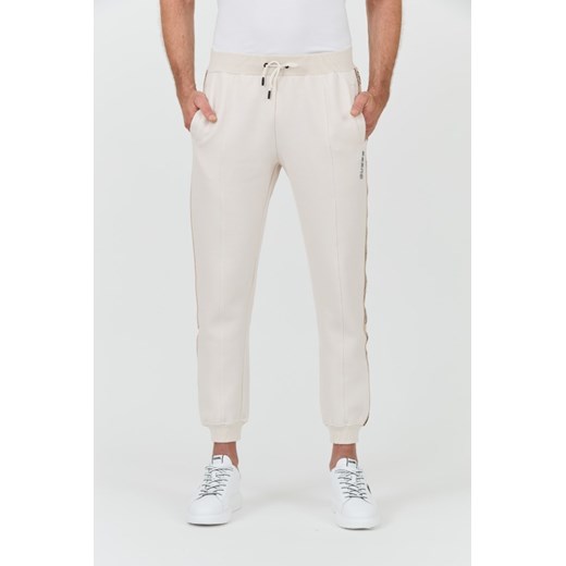 GUESS Beżowe spodnie Mickey Cuff Pant, Rozmiar M ze sklepu outfit.pl w kategorii Spodnie męskie - zdjęcie 183936165