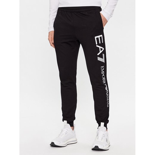 EA7 Emporio Armani Spodnie dresowe 7M000571 AF13512 MC001 Czarny Regular Fit ze sklepu MODIVO w kategorii Spodnie męskie - zdjęcie 183938077