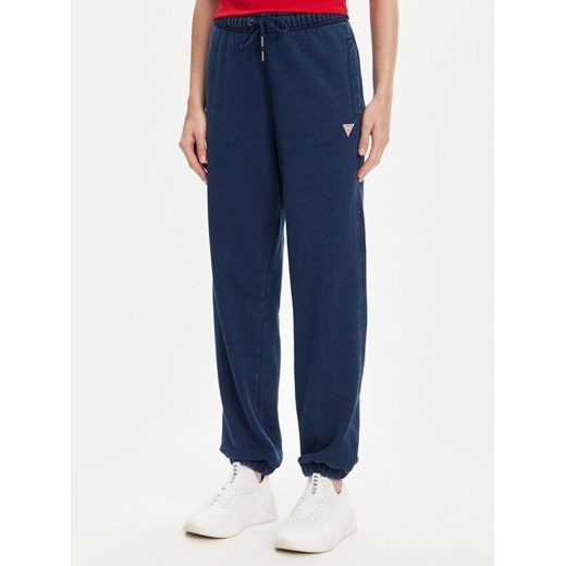Guess Spodnie dresowe W5YB65 KCXQ1 Granatowy Regular Fit ze sklepu MODIVO w kategorii Spodnie damskie - zdjęcie 183945888
