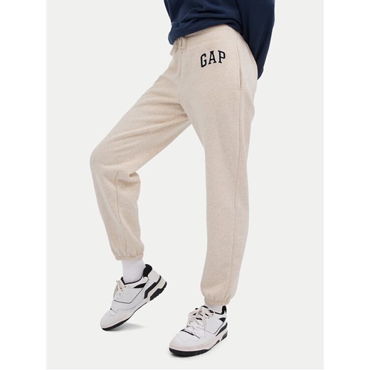 Gap Spodnie dresowe 463492-12 Beżowy Regular Fit ze sklepu MODIVO w kategorii Spodnie damskie - zdjęcie 183946306