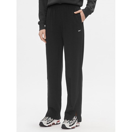 Reebok Spodnie dresowe Classics IL4647 Czarny Relaxed Fit ze sklepu MODIVO w kategorii Spodnie damskie - zdjęcie 183946699