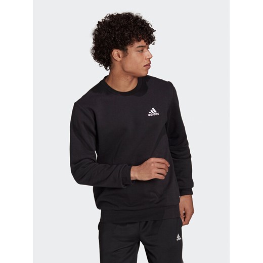 adidas Bluza Essentials Fleece Sweatshirt GV5295 Czarny Regular Fit ze sklepu MODIVO w kategorii Bluzy męskie - zdjęcie 183947207