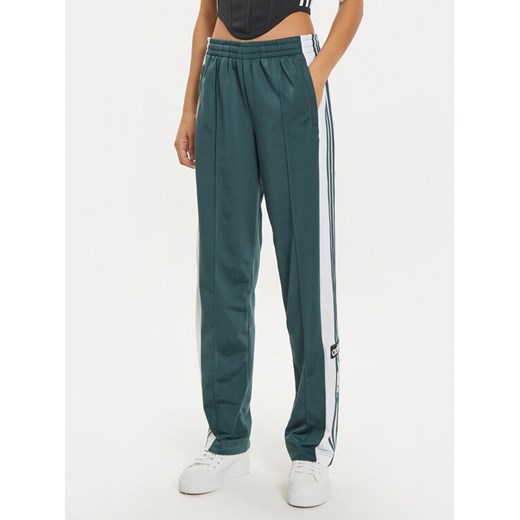 adidas Spodnie dresowe Adibreak IZ2761 Zielony Loose Fit ze sklepu MODIVO w kategorii Spodnie damskie - zdjęcie 183948257