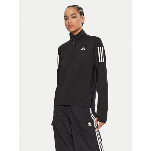 adidas Bluza techniczna Own the Run IK7440 Czarny Regular Fit ze sklepu MODIVO w kategorii Bluzy damskie - zdjęcie 183948665