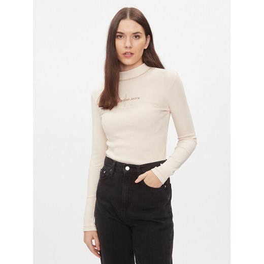 Calvin Klein Jeans Golf Hero Monologo J20J222973 Écru Slim Fit ze sklepu MODIVO w kategorii Bluzki damskie - zdjęcie 183985678