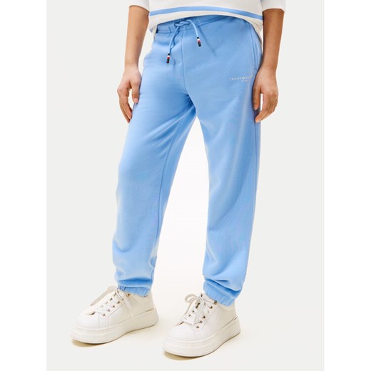 Tommy Hilfiger Spodnie dresowe KS0KS00596 Błękitny Regular Fit ze sklepu MODIVO w kategorii Spodnie chłopięce - zdjęcie 183985796