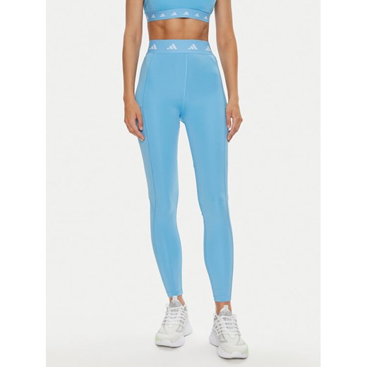 adidas Legginsy Techfit Stash IU1864 Błękitny Slim Fit ze sklepu MODIVO w kategorii Spodnie damskie - zdjęcie 184016106