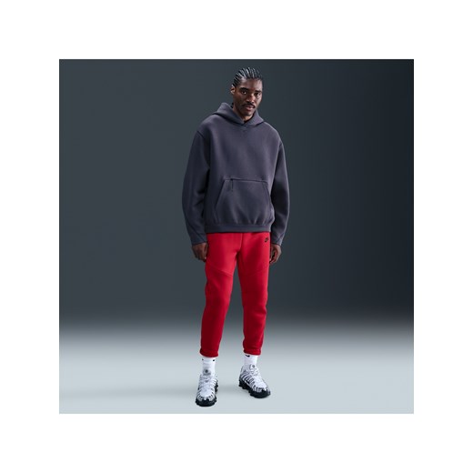 Męskie dzianinowe joggery Nike Tech - Czerwony ze sklepu Nike poland w kategorii Spodnie męskie - zdjęcie 184024696