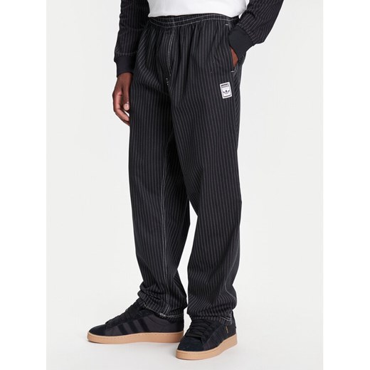 adidas Spodnie dresowe Wabash JP4489 Czarny Loose Fit ze sklepu MODIVO w kategorii Spodnie męskie - zdjęcie 184045848