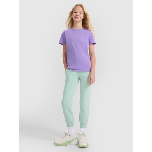 Dziewczęce spodnie dresowe joggery 4F 4FJWSS25TTROF1099 - zielone ze sklepu Sportstylestory.com w kategorii Spodnie dziewczęce - zdjęcie 184054787