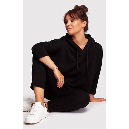 Bluza o luźnym kroju z kapturem w kolorze czarnym B239, Kolor czarny, Rozmiar 2XL/3XL, BE ze sklepu Primodo w kategorii Bluzy damskie - zdjęcie 184061218