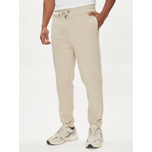 Boss Spodnie dresowe Se_brid 50513379 Beżowy Regular Fit ze sklepu MODIVO w kategorii Spodnie męskie - zdjęcie 184105438