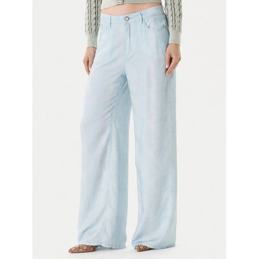 Guess Spodnie materiałowe 176485 Niebieski Slim Fit ze sklepu MODIVO w kategorii Spodnie damskie - zdjęcie 184158568