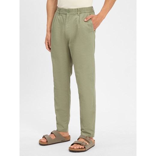 Tommy Jeans Chino - Isaac Mężczyźni Bawełna oliwkowy jednolity ze sklepu vangraaf w kategorii Spodnie męskie - zdjęcie 184182305