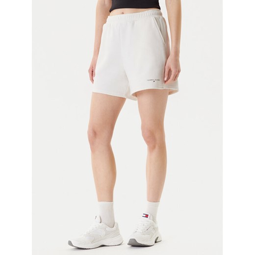 Tommy Jeans Szorty sportowe Linear DW0DW21152 Écru Relaxed Fit ze sklepu MODIVO w kategorii Szorty - zdjęcie 184197149