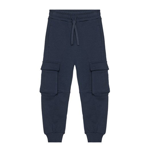 United Colors Of Benetton Spodnie dresowe 3UNICF066 Granatowy Regular Fit ze sklepu MODIVO w kategorii Spodnie chłopięce - zdjęcie 184199627