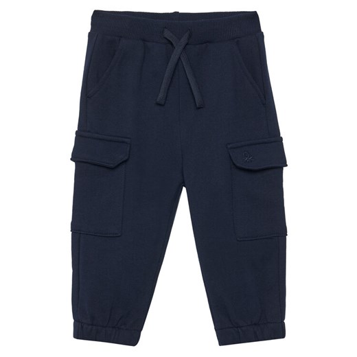 United Colors Of Benetton Spodnie dresowe 3UNIGF045 Granatowy Regular Fit ze sklepu MODIVO w kategorii Spodnie chłopięce - zdjęcie 184215855