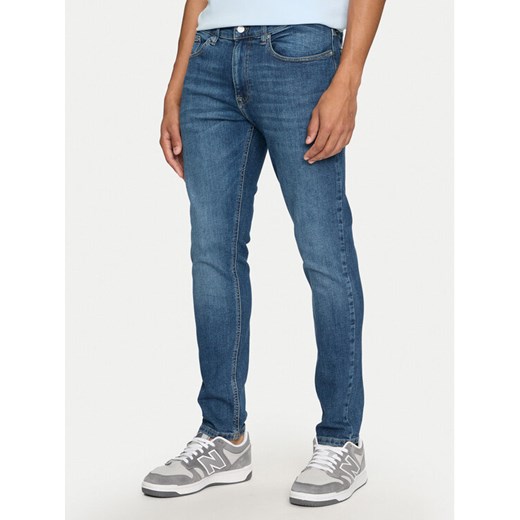 Tommy Jeans Jeansy Austin DM0DM20173 Niebieski Slim Fit ze sklepu MODIVO w kategorii Jeansy męskie - zdjęcie 184227969