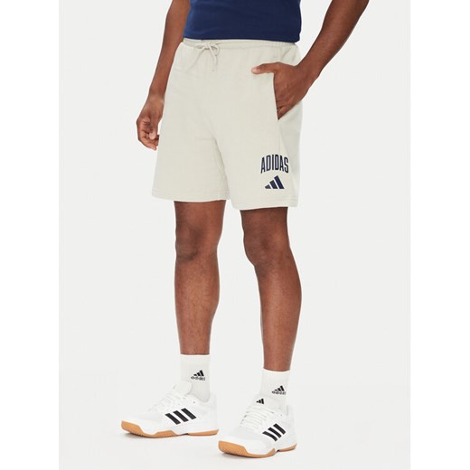 adidas Szorty sportowe Collegiate JM1726 Beżowy Regular Fit ze sklepu MODIVO w kategorii Spodenki męskie - zdjęcie 184231906