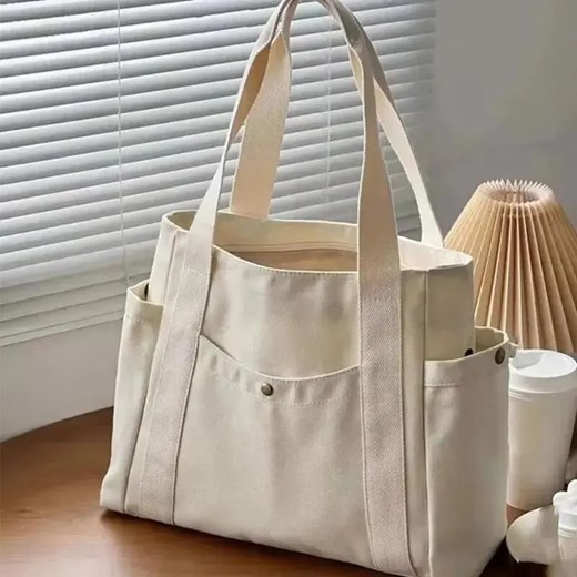 Płócienna torba shopper z kieszeniami - Beżowy ze sklepu Intimica.pl w kategorii Torby Shopper bag - zdjęcie 184258148