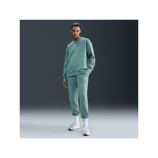 Damskie spodnie dresowe ze średnim stanem Nike Sportswear Phoenix Fleece - Zieleń ze sklepu Nike poland w kategorii Spodnie damskie - zdjęcie 184264488