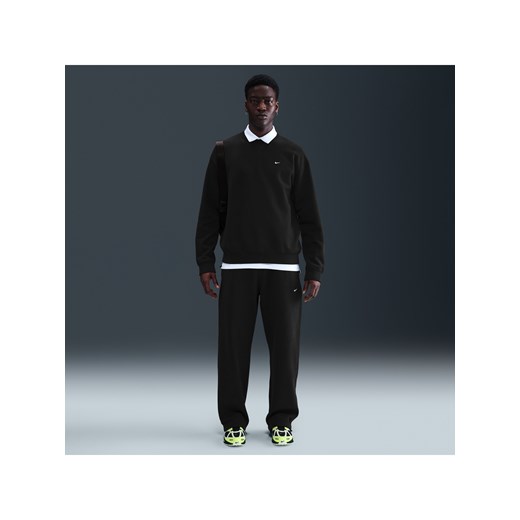 Męskie spodnie z dzianiny z luźnymi nogawkami Nike Solo Swoosh - Czerń ze sklepu Nike poland w kategorii Spodnie męskie - zdjęcie 184264558