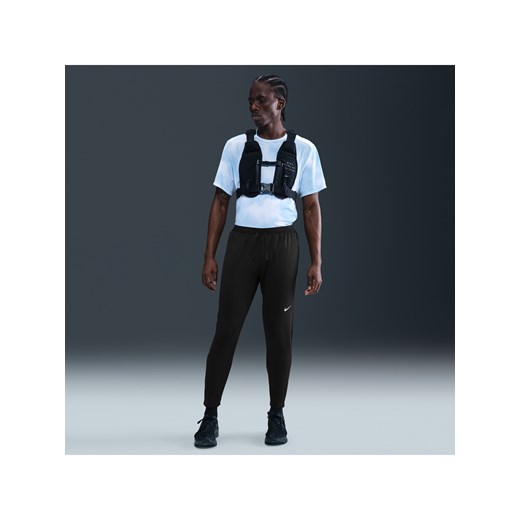 Męskie spodnie do biegania z dzianiny Dri-FIT Nike Stride - Czerń ze sklepu Nike poland w kategorii Spodnie męskie - zdjęcie 184264736