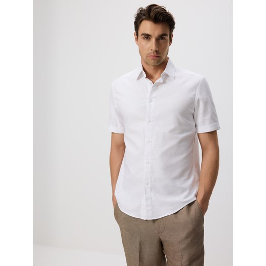 Reserved - Bawełniana koszula regular fit - biały ze sklepu Reserved w kategorii Koszule męskie - zdjęcie 184279135