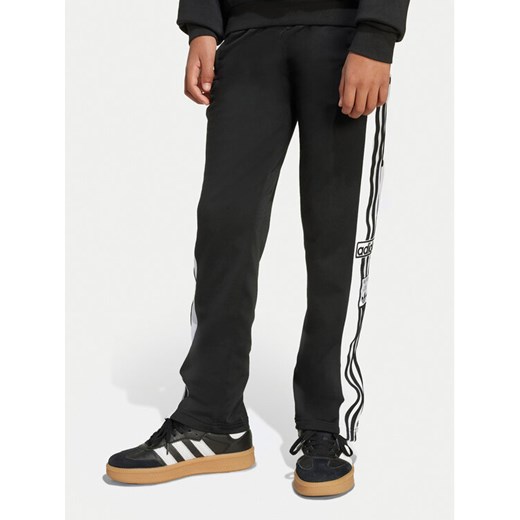 adidas Spodnie dresowe Adibreak JX1091 Czarny Regular Fit ze sklepu MODIVO w kategorii Spodnie chłopięce - zdjęcie 184282546