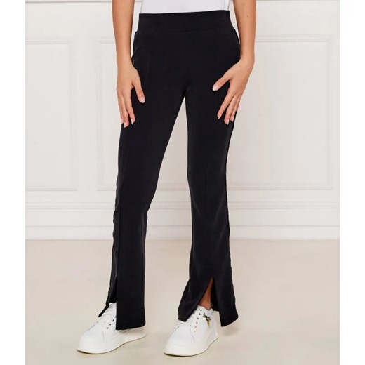 EA7 Spodnie dresowe | flare fit ze sklepu Gomez Fashion Store w kategorii Spodnie dziewczęce - zdjęcie 184296429