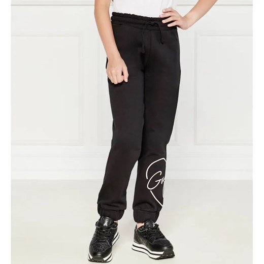 Guess Spodnie dresowe ACTIVE | Regular Fit ze sklepu Gomez Fashion Store w kategorii Spodnie dziewczęce - zdjęcie 184296526