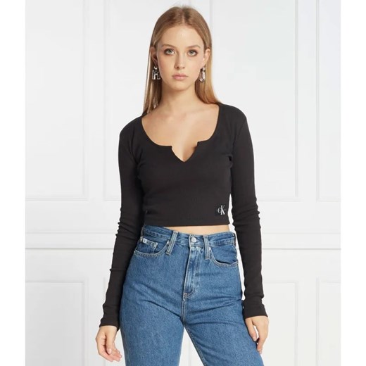 Calvin Klein Jeans Top SPLIT COLLAR RIB | Regular Fit ze sklepu Gomez Fashion Store w kategorii Bluzki damskie - zdjęcie 184325279
