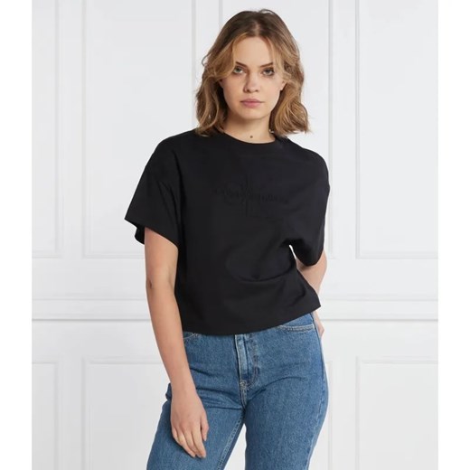 Calvin Klein Jeans T-shirt EMBOSSED MONOLOGO | Oversize fit ze sklepu Gomez Fashion Store w kategorii Bluzki damskie - zdjęcie 184328698