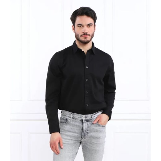 Calvin Klein Jeans Koszula MONOLOGO BADGE | Relaxed fit ze sklepu Gomez Fashion Store w kategorii Koszule męskie - zdjęcie 184330036