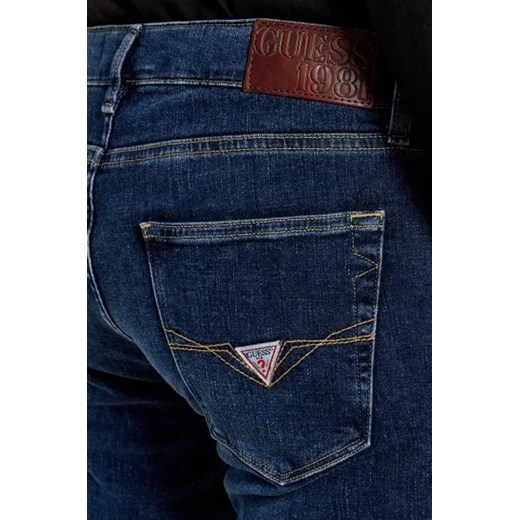 Jeansy męskie Guess z elastanu 