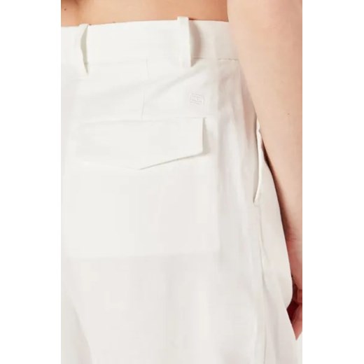 Tommy Hilfiger Spodnie | flare fit | z dodatkiem lnu Tommy Hilfiger 42 okazja Gomez Fashion Store