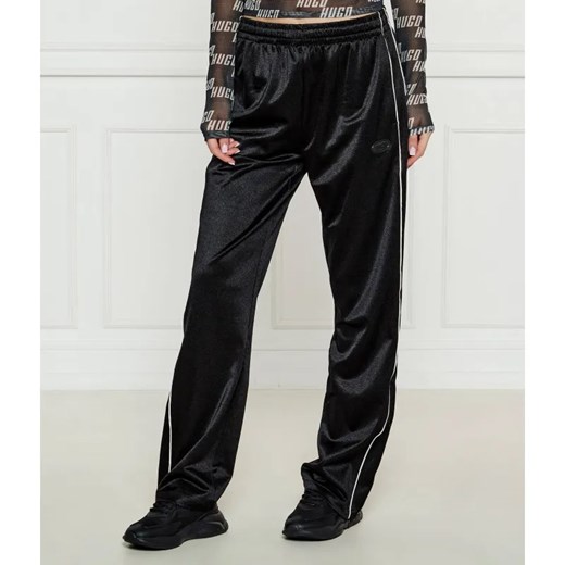HUGO Spodnie dresowe Neannet | flare fit ze sklepu Gomez Fashion Store w kategorii Spodnie damskie - zdjęcie 184504955