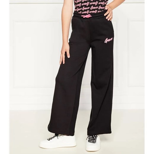 Guess Spodnie dresowe | Regular Fit ze sklepu Gomez Fashion Store w kategorii Spodnie dziewczęce - zdjęcie 184505806