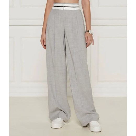 Marc Cain Spodnie | flare fit | z dodatkiem wełny ze sklepu Gomez Fashion Store w kategorii Spodnie damskie - zdjęcie 184506265