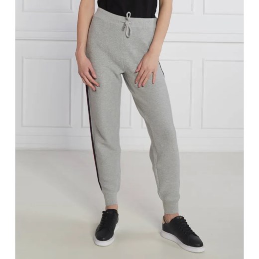Tommy Hilfiger Spodnie jogger GLOBAL STP | Relaxed fit ze sklepu Gomez Fashion Store w kategorii Spodnie damskie - zdjęcie 184506326