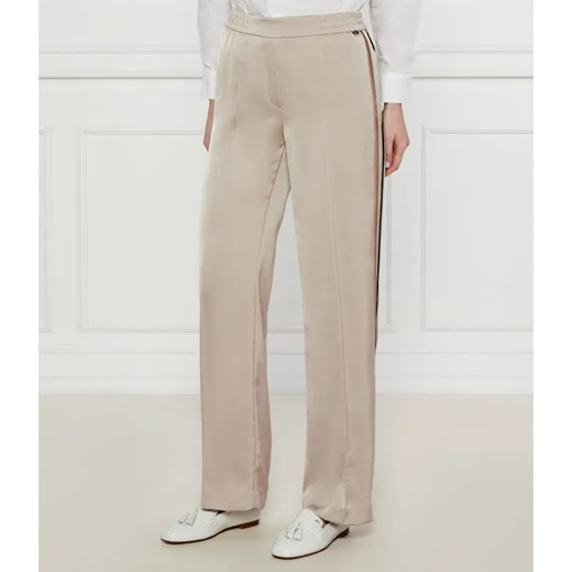 Marc Cain Satynowe spodnie Washington | flare fit ze sklepu Gomez Fashion Store w kategorii Spodnie damskie - zdjęcie 184506539