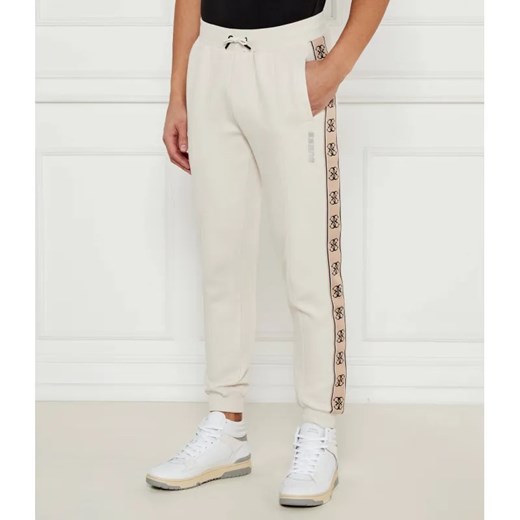 GUESS ACTIVE Spodnie dresowe Mickey | Regular Fit ze sklepu Gomez Fashion Store w kategorii Spodnie męskie - zdjęcie 184507229