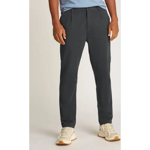Tommy Jeans Spodnie Isaac | Slim Fit ze sklepu Gomez Fashion Store w kategorii Spodnie męskie - zdjęcie 184507328