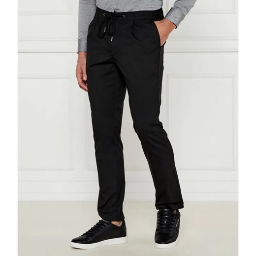 Michael Kors Spodnie | Tapered | stretch ze sklepu Gomez Fashion Store w kategorii Spodnie męskie - zdjęcie 184507667