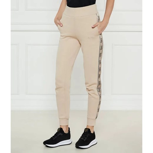 GUESS ACTIVE Spodnie dresowe BRITNEY | Regular Fit ze sklepu Gomez Fashion Store w kategorii Spodnie damskie - zdjęcie 184507985
