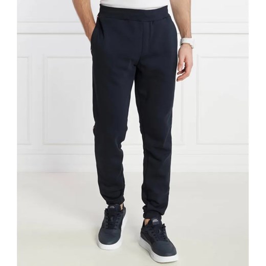 Tommy Hilfiger Spodnie dresowe GLOBAL STRIPE | Regular Fit ze sklepu Gomez Fashion Store w kategorii Spodnie męskie - zdjęcie 184509726