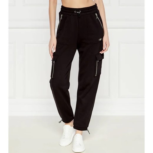 Michael Kors Spodnie jogger | Regular Fit ze sklepu Gomez Fashion Store w kategorii Spodnie damskie - zdjęcie 184509746