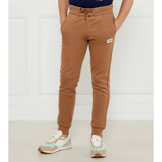 Tommy Hilfiger Spodnie dresowe | Regular Fit ze sklepu Gomez Fashion Store w kategorii Spodnie chłopięce - zdjęcie 184510338