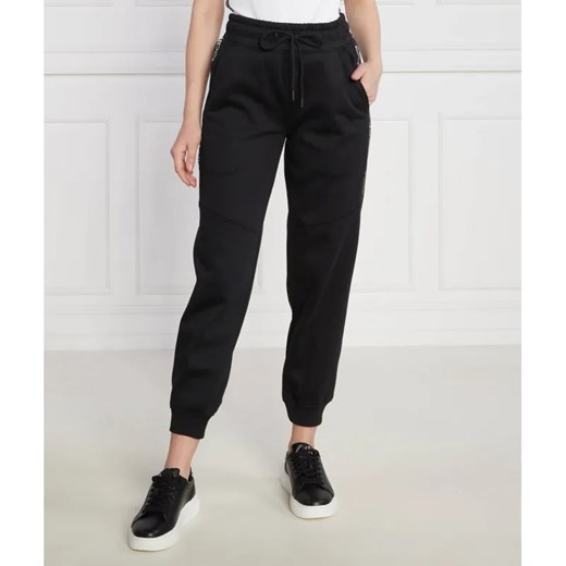 Calvin Klein Jeans Spodnie dresowe JOG | Regular Fit ze sklepu Gomez Fashion Store w kategorii Spodnie damskie - zdjęcie 184512027